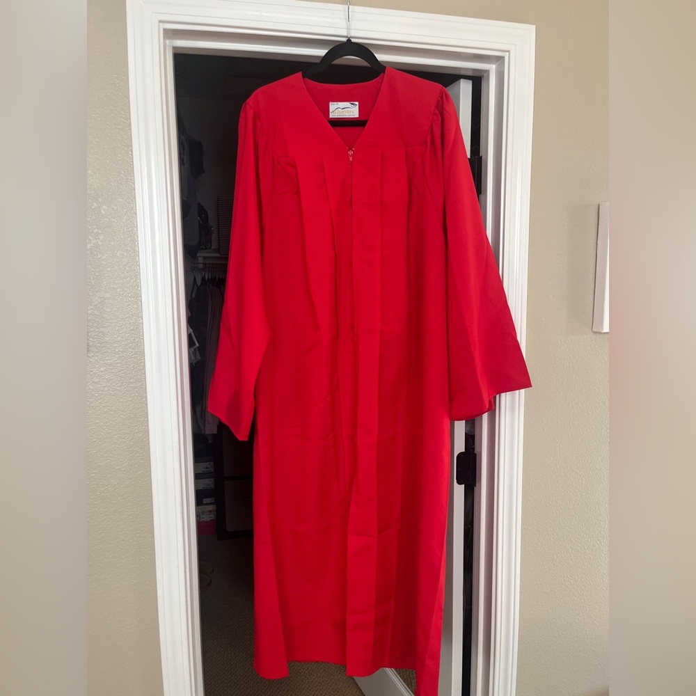 Red graduation cap and gown